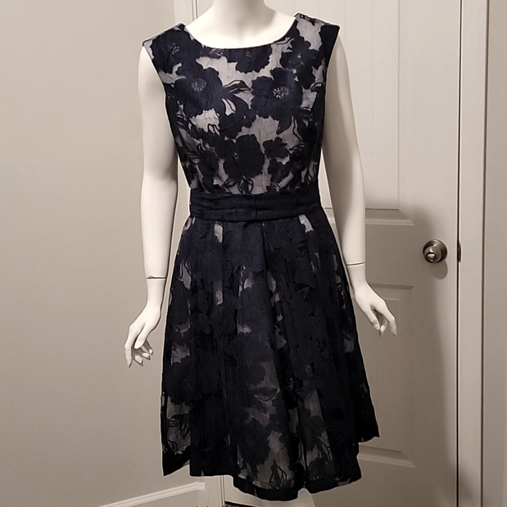 Navy blue lace/white underlay dress size 10. Belt ties into bow in back.